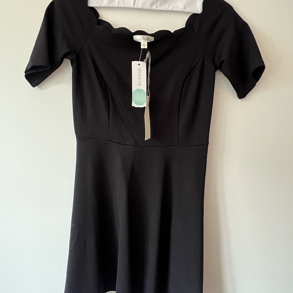 Nine Britton Black dress with scalloped neckline